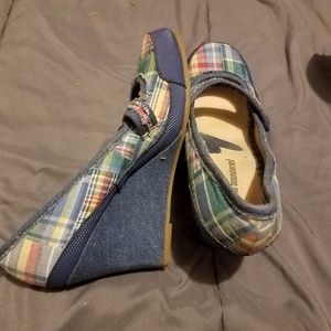 Plaid fabric wedge heels.